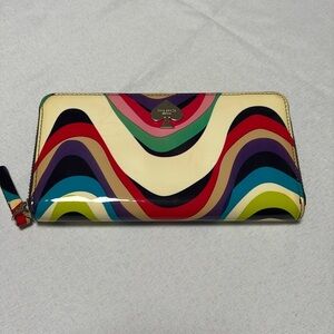 KATE SPADE ♠️ Women’s Zip wallet, storybook lining. Spade has slight scratches.